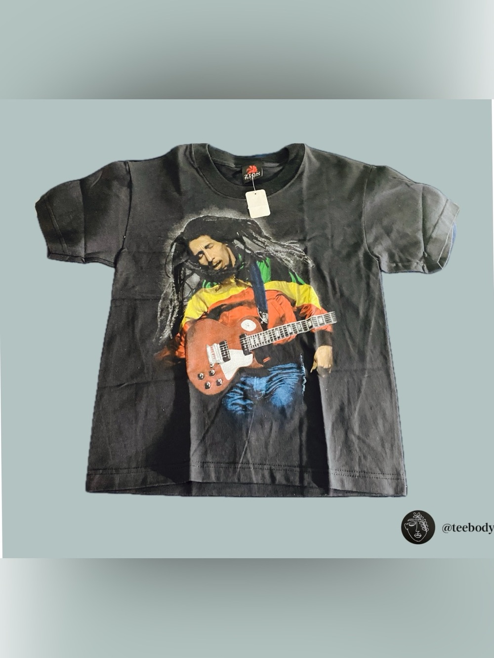 Zion Rootswear Black Kids Tee with Bob Marley Guitar Graphic